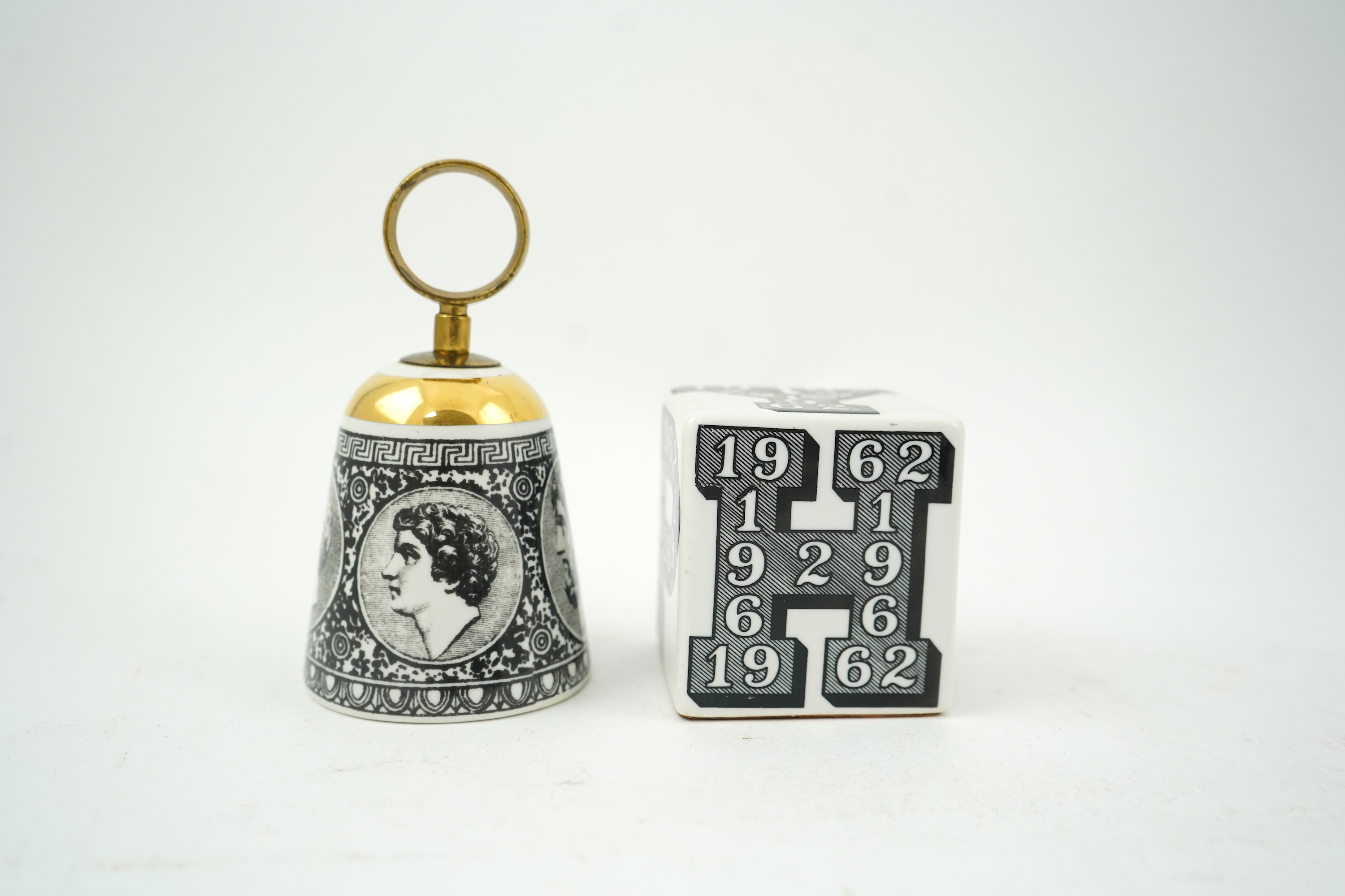 Piero Fornasetti (Italian, 1913-1988): A collection of Fornasetti desk items and dishes